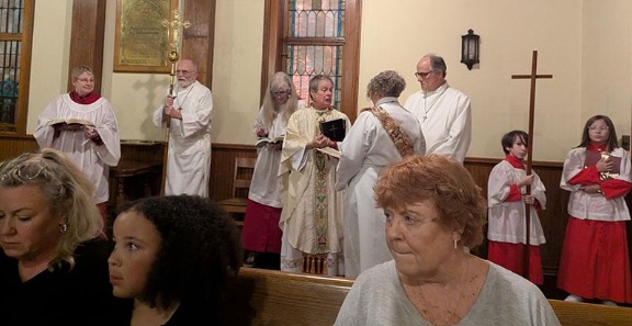 Members of the Altar Party preparing for a service.